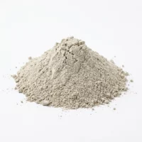 Pile of light gray powder on a white background with a small spread around the base.